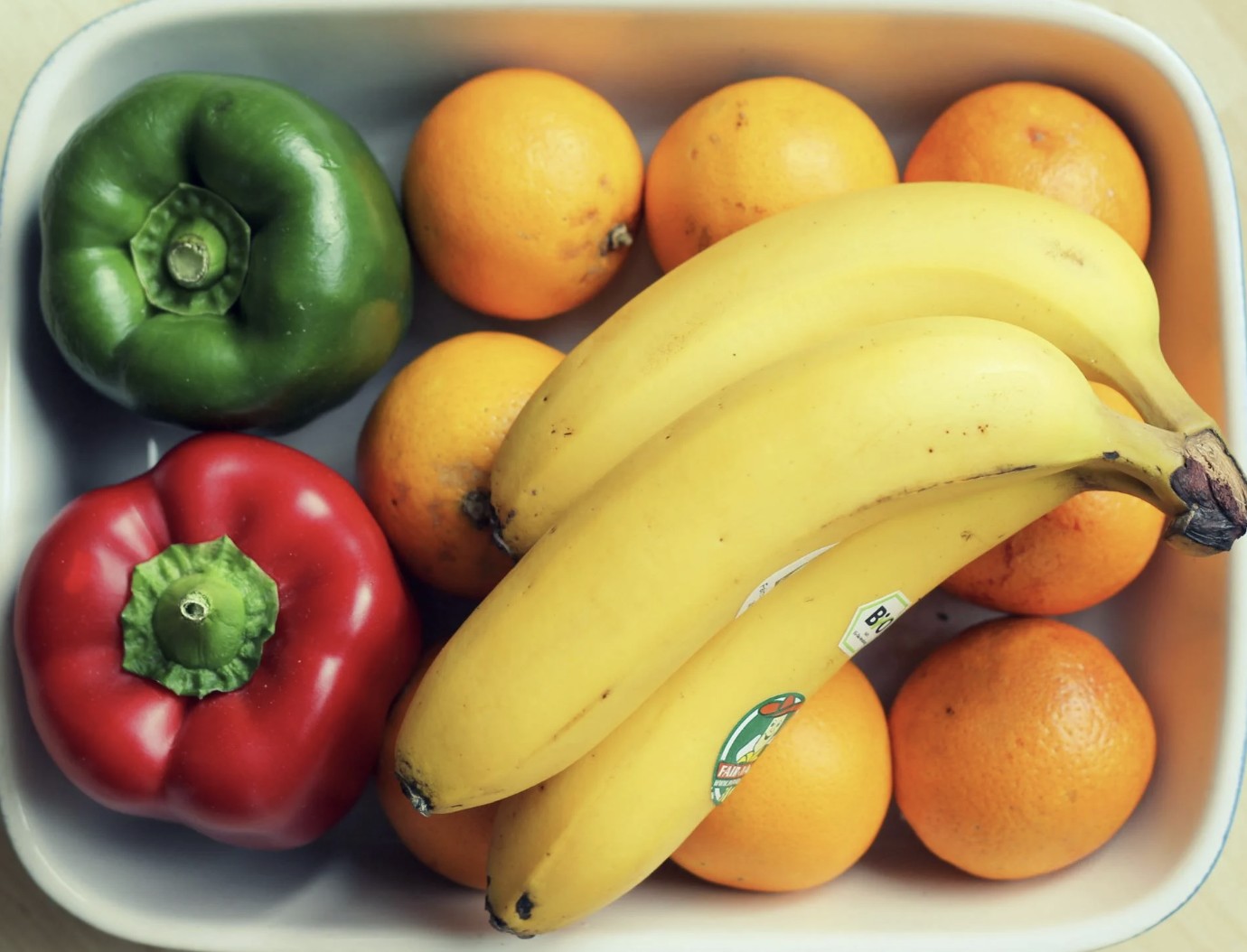 Yellow Bananas and Two Peppers