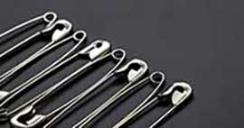 hole in a safety pin